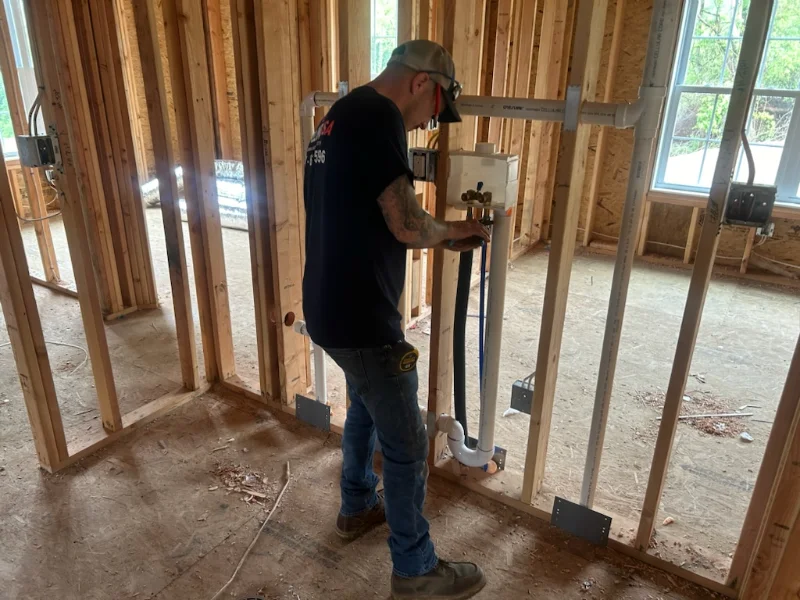Pipeline USA worker installing pipes.