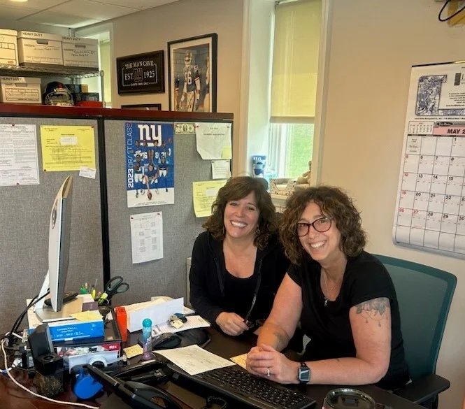 Two female office managers.